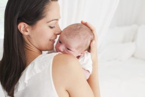 motherholdingbaby